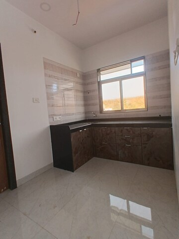 Kitchen in 1 BHK Apartment at Nine Rajshree Complex, Naigaon East – for Sale