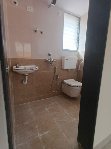 Bathroom in 1 BHK Apartment at Nine Rajshree Complex, Naigaon East – for Sale