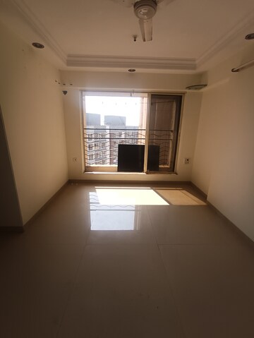 Living Room in 1 BHK Apartment at Agarwal Trinity Towers, Malad West – for Rent