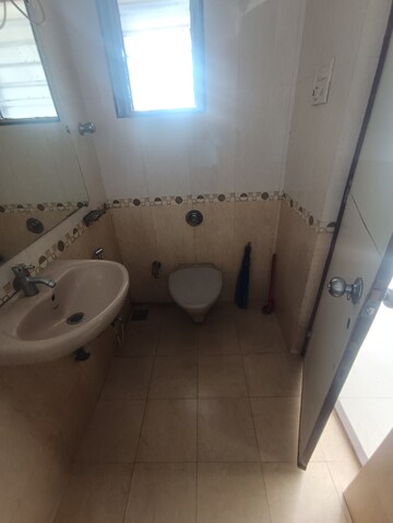 Bathroom in 1 BHK Apartment at Agarwal Trinity Towers, Malad West – for Rent