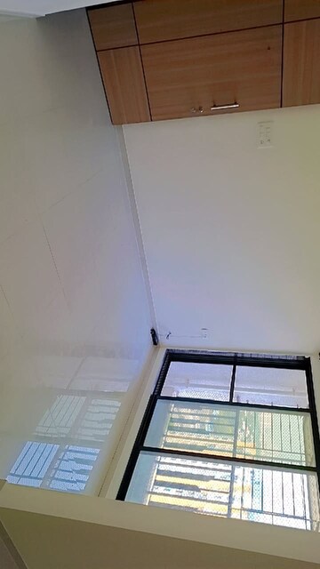 Staircase in 2 BHK Apartment at Dynamic Crest, Shilphata – for Sale