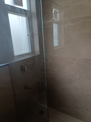 Bathroom in 3 BHK Apartment at Smart World Orchard, Sector 61 – for Rent