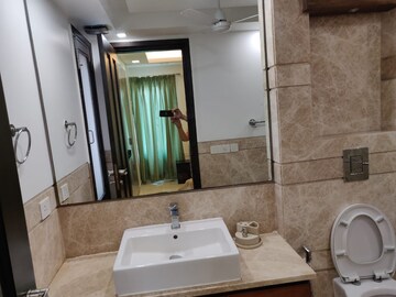 Bathroom in 3 BHK Builder Floor at Panchsheel Enclave – for Sale