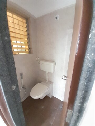 Bathroom in 1 BHK Apartment at Neel Sidhi Infinity, Khanda Colony – for Rent