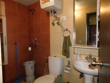 Bathroom in 4 BHK Apartment at Mahagun Mywoods, Sector 16c Greater Noida – for Rent