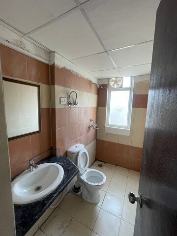 Bathroom in 2 BHK Apartment at Amrapali Golf Homes, Sector 4 Greater Noida – for Rent