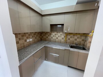 Kitchen in 2 BHK Apartment at Amrapali Golf Homes, Sector 4 Greater Noida – for Rent
