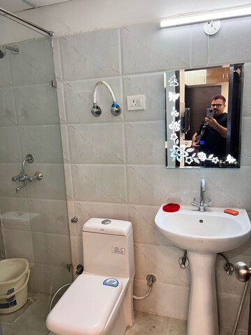 Bathroom in 3 BHK Apartment at Amrapali Golf Homes, Sector 4 Greater Noida – for Rent