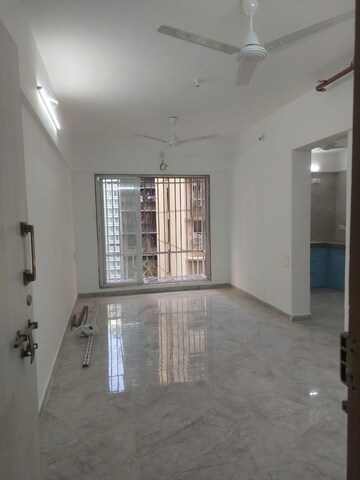 Living Room in 1 BHK Apartment at Shraddha Panache, Tagore Nagar – for Rent