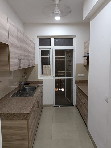 Kitchen in 3 BHK Apartment at Dhoot Time Residency, Sector 63 – for Rent