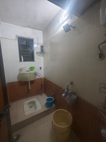 Bathroom in 2 BHK Apartment at Seawoods Sector 50 – for Rent