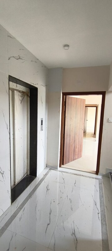 Building Lobby in 2 BHK Apartment at Omkara Unchai, Borivali West – for Sale