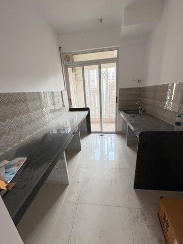 Kitchen in 2 BHK Apartment at Lodha Codename Premier, Dombivli East – for Rent