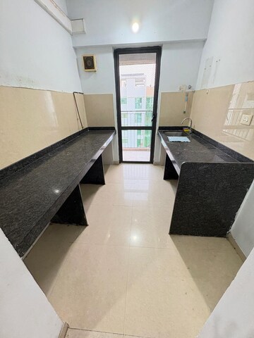 Kitchen in 2 BHK Apartment at Lodha Lakeshore Greens, Dombivli East – for Rent