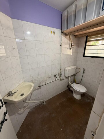 Bathroom in 2 BHK Apartment at Karan Gharonda, Wadgaon Sheri – for Rent