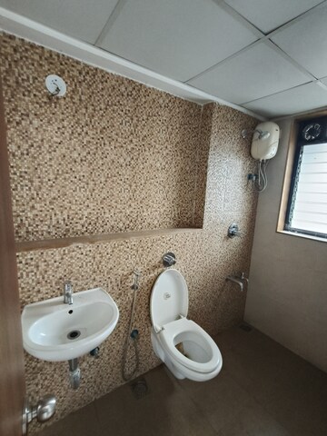 Bathroom in 2 BHK Apartment at Lodha Downtown, Dombivli East – for Rent