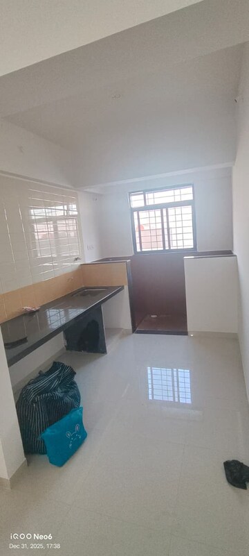 Kitchen in 2 BHK Apartment at Royal Ishana, Thergaon – for Rent