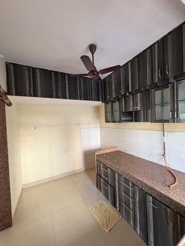 Kitchen in 2.5 BHK Apartment at Vasundhara CHS Manpada, Manpada – for Rent