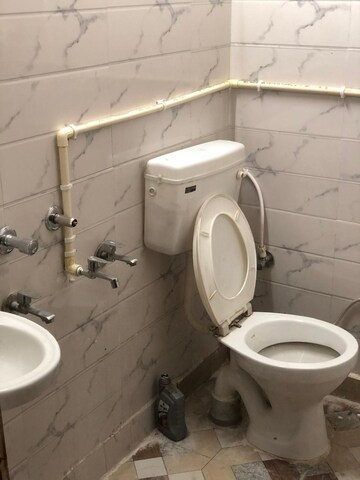 Bathroom in 1.5 BHK Builder Floor at Nawada – for Sale