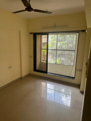 Room in 2 BHK Apartment at Suraksha Apartment, Andheri West – for Rent