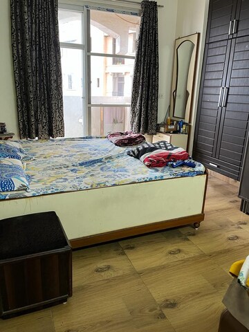 Bedroom in 4 BHK Apartment at Amrapali Platinum, Sector 119 – for Sale