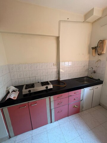 Kitchen in 1 BHK Apartment at Rajnigandha CHS Vasant Vihar, Vasant Vihar – for Rent