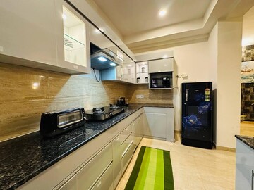 Kitchen in 3 BHK Apartment at Omaxe The Palace, Gomti Nagar – for Rent