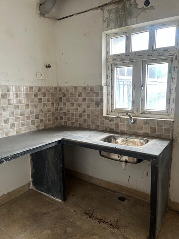 Kitchen in 2 BHK Apartment at Chinar Park – for Sale