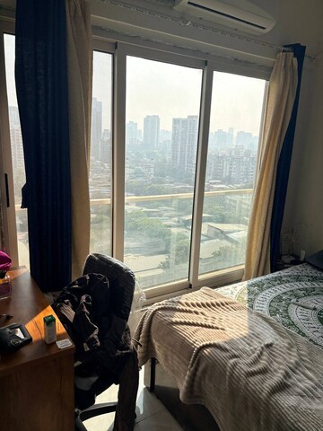 Bedroom in 2 BHK Apartment at Rajendra Dolphin Tower, Malad West – for Rent
