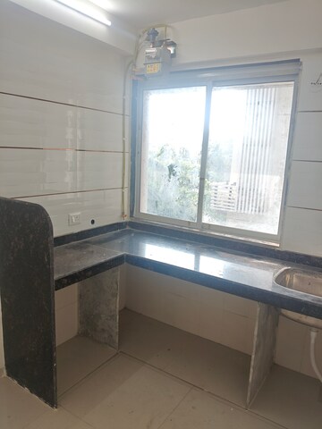 Kitchen in 1.5 BHK Apartment at Tarun Bharat – for Rent