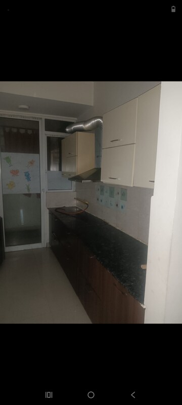Kitchen in 2 BHK Apartment at Mahagun Mirabella, Sector 79 – for Rent