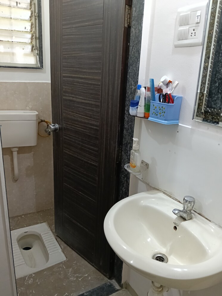 Bathroom, wakad 1 Bedroom 625 Sq.Ft. Apartment In Wakad Pune 9763835