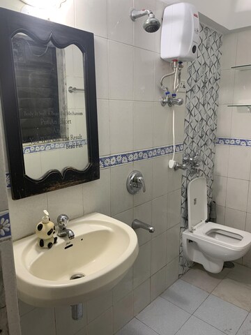 Bathroom in 2 BHK Apartment at Kabra Metro One, Andheri West – for Rent