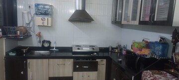 Kitchen in 2 BHK Apartment at Dreams Nandini, Shewalwadi – for Rent