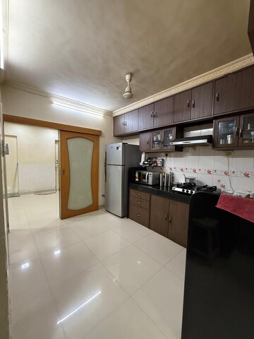 Kitchen in 2 BHK Apartment at New Jay Palace, Yari Road – for Rent