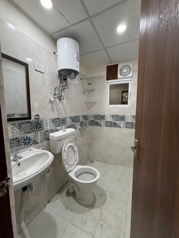 Bathroom in 3 BHK Apartment at Unitech Fresco, Sector 50 – for Rent
