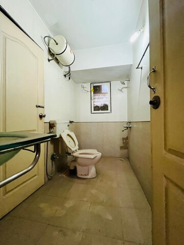 Bathroom in 2 BHK Apartment at Venkatesh Flora Phase II, Mundhwa – for Rent