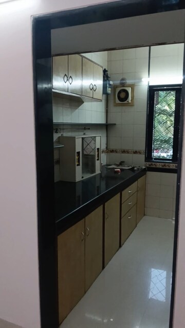 Kitchen in 2 BHK Apartment at Rail Vihar CHS, Kharghar Sector 4 – for Rent