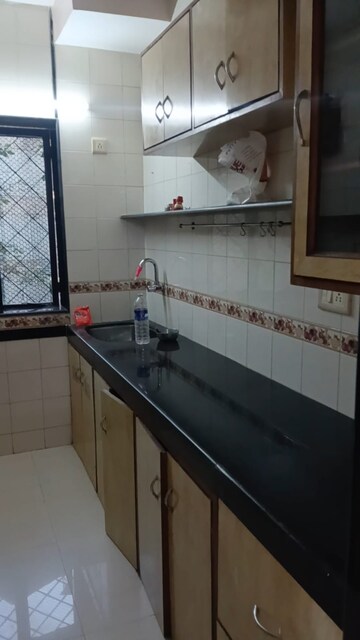 Kitchen in 2 BHK Apartment at Rail Vihar CHS, Kharghar Sector 4 – for Rent