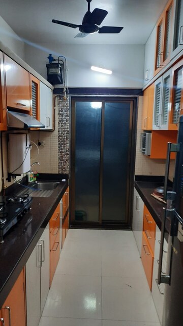 Kitchen in 2 BHK Apartment at Tharwani Heritage, Kharghar Sector 7 – for Rent