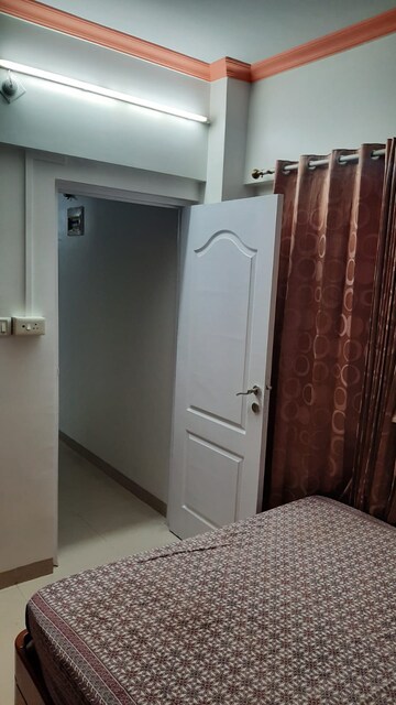 Bedroom in 2 BHK Apartment at Tharwani Heritage, Kharghar Sector 7 – for Rent
