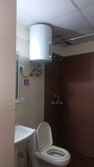 Bathroom in 2 BHK Apartment at Aims Golf Avenue II, Sector 75 – for Rent