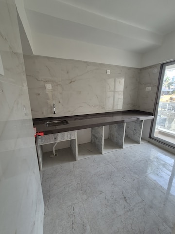 Kitchen in 3 BHK Apartment at Pafilia Sunita Heights, Naupada – for Sale