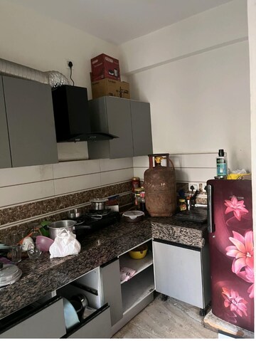 Kitchen in 3 BHK Apartment at Migsun Ultimo, Omicron Iii Greater Noida – for Rent