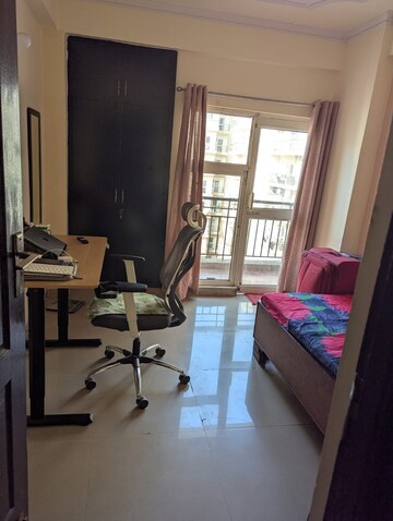 Living Room in 2 BHK Apartment at Aims Golf City, Sector 75 – for Rent