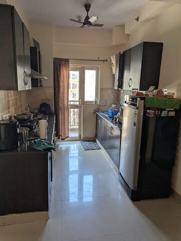 Kitchen in 2 BHK Apartment at Aims Golf City, Sector 75 – for Rent