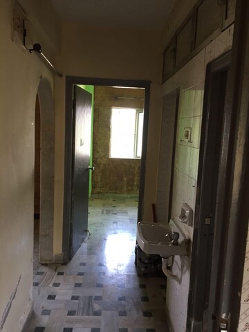 Room in 1 BHK Apartment at Link Palace, Malad West – for Sale