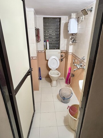 Bathroom in 1 BHK Apartment at Jyoti Castle, Malad West – for Rent