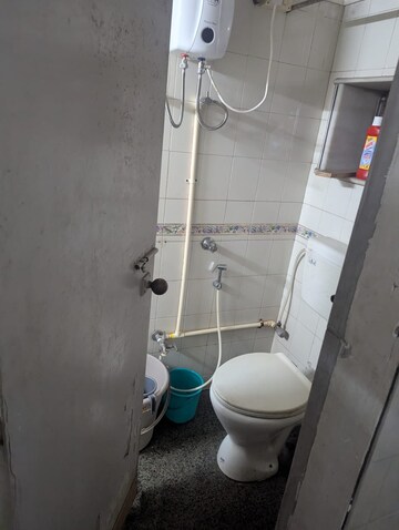 Bathroom in 2 BHK Apartment at Om Viraj Apartment, Andheri West – for Rent