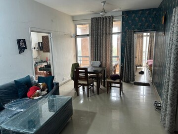 Living Room in 2 BHK Apartment at Ansal Paradise Crystal, Sushant Golf City – for Rent